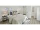 Well lit bedroom with bed and contemporary bedside tables at 2111 E Ellicott St, Tampa, FL 33610