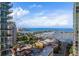 Overhead view captures luxury apartments with balconies, showcasing a marina and ocean in the background at 215 Central Ave # 4H, St Petersburg, FL 33701