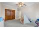 Bedroom with closet and ceiling fan at 215 Central Ave # 4H, St Petersburg, FL 33701