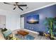 Living room featuring modern decor, a ceiling fan, and light hardwood floors at 215 Central Ave # 4H, St Petersburg, FL 33701