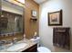 Bathroom featuring a vanity, toilet, glass door shower, and tiled floor at 229 Tazewell Dr, Port Charlotte, FL 33954