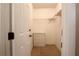 Walk-in closet with shelving and a small dresser at 229 Tazewell Dr, Port Charlotte, FL 33954