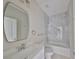 Bathroom with a tub and shower combo, stylish hardware, and vanity sink at 2807 W Granfield Ave, Plant City, FL 33563