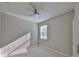 Cozy bedroom with ceiling fan, natural light, and clean, modern finishes at 2807 W Granfield Ave, Plant City, FL 33563