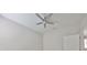 Bedroom featuring a modern ceiling fan and a white door at 2807 W Granfield Ave, Plant City, FL 33563