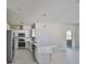 Spacious kitchen features stainless steel appliances, an island, and recessed lighting at 2807 W Granfield Ave, Plant City, FL 33563