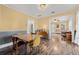 Charming dining room with modern lighting, hardwood floors, and lots of sunlight at 3000 2Nd N Ave, St Petersburg, FL 33713