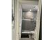 Bathroom featuring a sleek glass-enclosed shower with updated fixtures and tile at 3106 W Dewey, Tampa, FL 33607