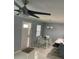Cozy dining area adjacent to the kitchen with a modern chandelier at 3106 W Dewey, Tampa, FL 33607