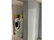 A laundry room with a modern washing machine and laundry supplies at 3106 W Dewey, Tampa, FL 33607