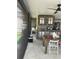Outdoor kitchen is well-equipped with stainless appliances, sink, and overhead storage at 3106 W Dewey, Tampa, FL 33607