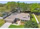 Beautiful single-story home featuring a two-car garage, manicured lawn, and charming landscaping at 3952 Applegate Cir, Brandon, FL 33511