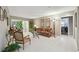 Cozy living room with comfortable seating, stylish decor, and view to exterior patio at 3952 Applegate Cir, Brandon, FL 33511