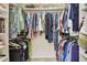 Spacious walk-in closet with ample storage, shelving, and hanging space for an organized wardrobe at 3952 Applegate Cir, Brandon, FL 33511