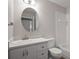 Bathroom featuring neutral colors, vanity with drawers, and a shower-tub combination at 39650 Us Highway 19 N # 615, Tarpon Springs, FL 34689