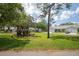 Landscaped grounds surrounding well-maintained homes create a beautiful and inviting community atmosphere at 39650 Us Highway 19 N # 615, Tarpon Springs, FL 34689