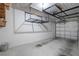 Clean garage space featuring overhead storage racks and ample room for vehicles at 39650 Us Highway 19 N # 615, Tarpon Springs, FL 34689