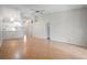 Spacious living room with high ceilings and modern light fixture offers a comfortable atmosphere at 39650 Us Highway 19 N # 615, Tarpon Springs, FL 34689