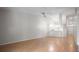 Inviting living room boasting sleek flooring, ample natural light, and a contemporary ceiling fan at 39650 Us Highway 19 N # 615, Tarpon Springs, FL 34689