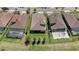 Aerial view reveals expansive backyard space between neighbors, enclosed by a fence at 4782 Night Star Trl, Odessa, FL 33556