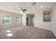 Bonus room featuring carpeting, recessed lights and multiple windows for natural light at 4782 Night Star Trl, Odessa, FL 33556