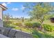 Relaxing balcony with a picturesque view of the lush green golf course and a clear blue sky at 5625 Escondida S Blvd, St Petersburg, FL 33715