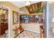 Inviting entryway with high ceilings, staircase, and elegant decor creates a warm, welcoming ambiance at 5625 Escondida S Blvd, St Petersburg, FL 33715
