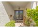 Inviting front entrance with double doors, decorative plants, and a welcoming ambiance at 5625 Escondida S Blvd, St Petersburg, FL 33715