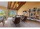 Bright living room featuring comfortable seating, golf course views, and stylish decor at 5625 Escondida S Blvd, St Petersburg, FL 33715