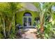 Charming front entrance with tropical plants and decor at 5953 36Th N Ave, St Petersburg, FL 33710