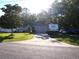 Charming single-story home with a well-maintained lawn, inviting curb appeal, and driveway parking at 6701 Medlar Dr, New Port Richey, FL 34653