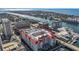 Aerial view of the building complex near a waterway, with downtown skyline in background at 700 S Harbour Island Blvd # 240, Tampa, FL 33602