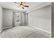 Bedroom with a ceiling fan, window, and carpet at 700 S Harbour Island Blvd # 240, Tampa, FL 33602