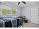 Bedroom featuring natural light from the window and a ceiling fan at 724 38Th Ne Ave, St Petersburg, FL 33704