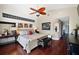 Luxurious bedroom with a bench, vanity, and interesting art pieces, perfect for relaxation at 8032 13Th S Ave, St Petersburg, FL 33707