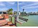 Private boat dock with a boat lift, offering convenient access to waterways and nautical adventures at 8032 13Th S Ave, St Petersburg, FL 33707