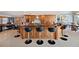 Open kitchen concept with breakfast bar and adjacent dining area at 8032 13Th S Ave, St Petersburg, FL 33707