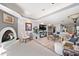 Bright living room featuring stylish furniture and an elegant fireplace at 8032 13Th S Ave, St Petersburg, FL 33707