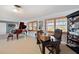 Inviting living area with piano, office space and natural light at 8032 13Th S Ave, St Petersburg, FL 33707