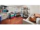 Office featuring colorful storage, hardwood floors, a workstation, and plenty of natural light at 8032 13Th S Ave, St Petersburg, FL 33707