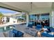 Features a covered patio with outdoor seating, a fire pit, and a waterfront view at 8032 13Th S Ave, St Petersburg, FL 33707