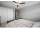 Spacious bedroom with large closets, neutral tones and a comfortable bed, offering a serene retreat at 8141 Carlton Ridge Dr, Land O Lakes, FL 34638
