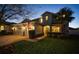 Charming two-story home with a well-manicured lawn, a brick driveway, and a welcoming front porch at 8141 Carlton Ridge Dr, Land O Lakes, FL 34638