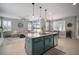 Spacious kitchen features a large island, stainless steel appliances, and ample cabinet space at 8141 Carlton Ridge Dr, Land O Lakes, FL 34638