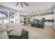 Open-concept living area with seamless flow between the kitchen, dining, and living spaces at 8141 Carlton Ridge Dr, Land O Lakes, FL 34638