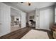 Versatile room with barn doors leading to the living room, office space, and closet for storage at 8141 Carlton Ridge Dr, Land O Lakes, FL 34638