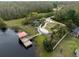 Scenic aerial view of a playground, dock, and trails, offering recreational opportunities at 8141 Carlton Ridge Dr, Land O Lakes, FL 34638