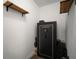 Storage area featuring a large safe and custom built-in wooden shelves at 8141 Carlton Ridge Dr, Land O Lakes, FL 34638