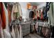 Spacious walk-in closet with ample storage and custom shelving, providing organization and style at 8141 Carlton Ridge Dr, Land O Lakes, FL 34638