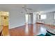 Spacious bedroom with laminate wood flooring, walk-in closet, and open doorway to the bathroom at 8454 111Th St # 201, Seminole, FL 33772